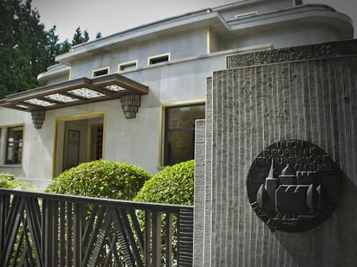 Front of Villa Empain with fence taken from the street