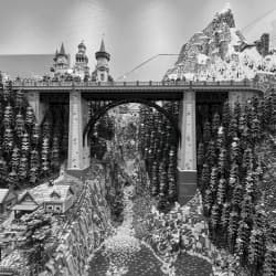 Huge LEGO diorama of a bridge over a stream